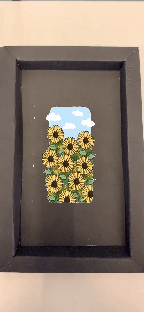 Sunflower clip; made with resin pieces, paint and beads.
