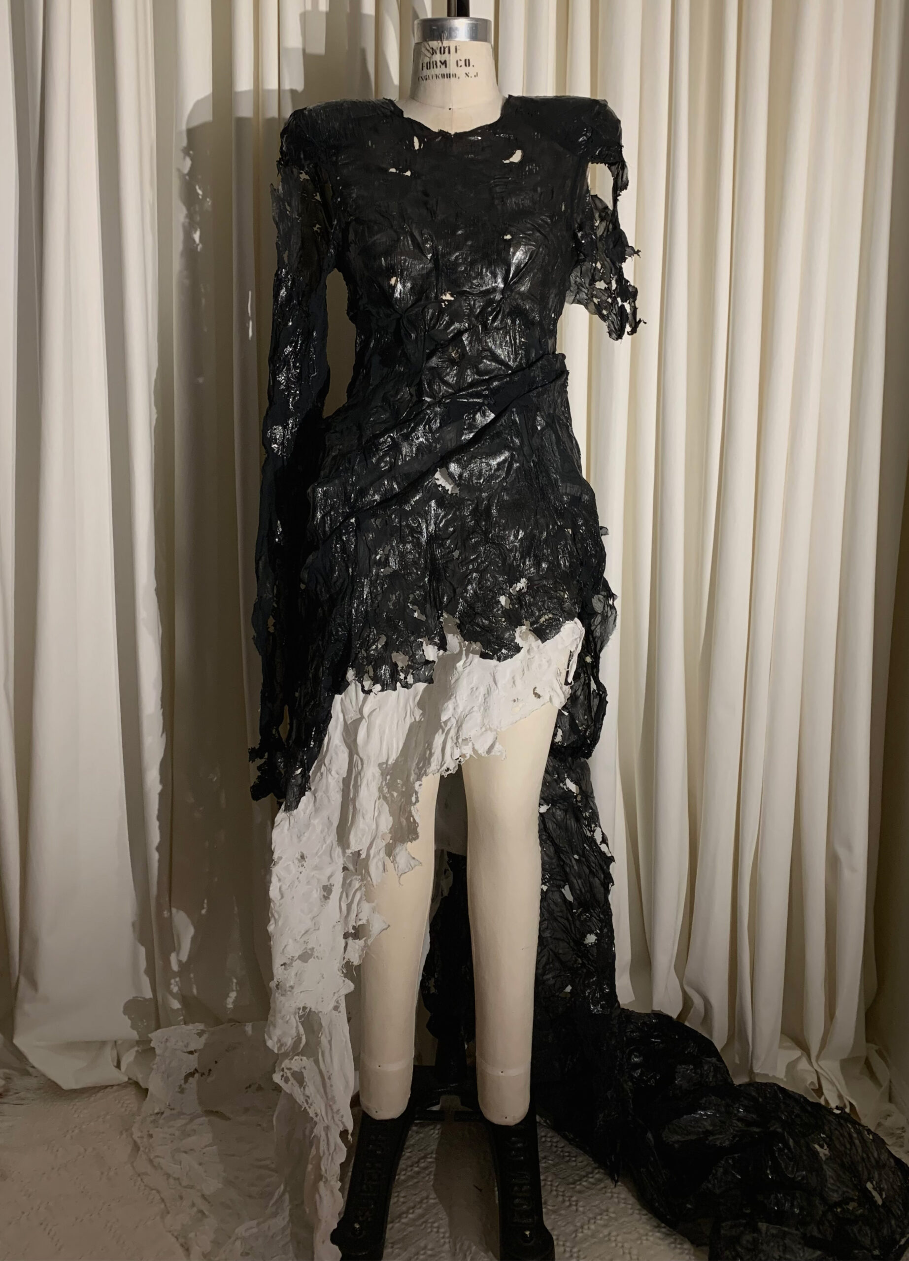 Oil spill gown, with asymmetrical melted crinoline. Layers of melted chiffon and glue laminated into a 4 foot train.