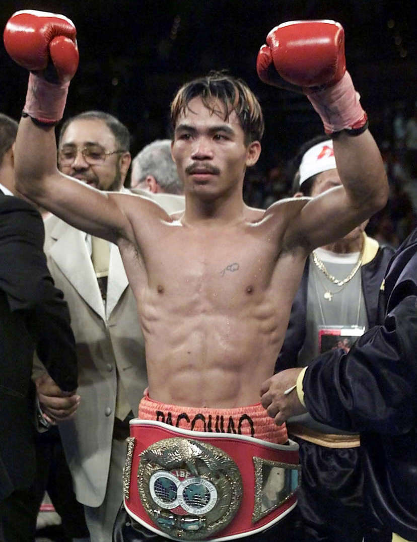 Research image #2: Manny Pacquiao winning the Junior Featherweight division class belt against Lehlo Ledwaba